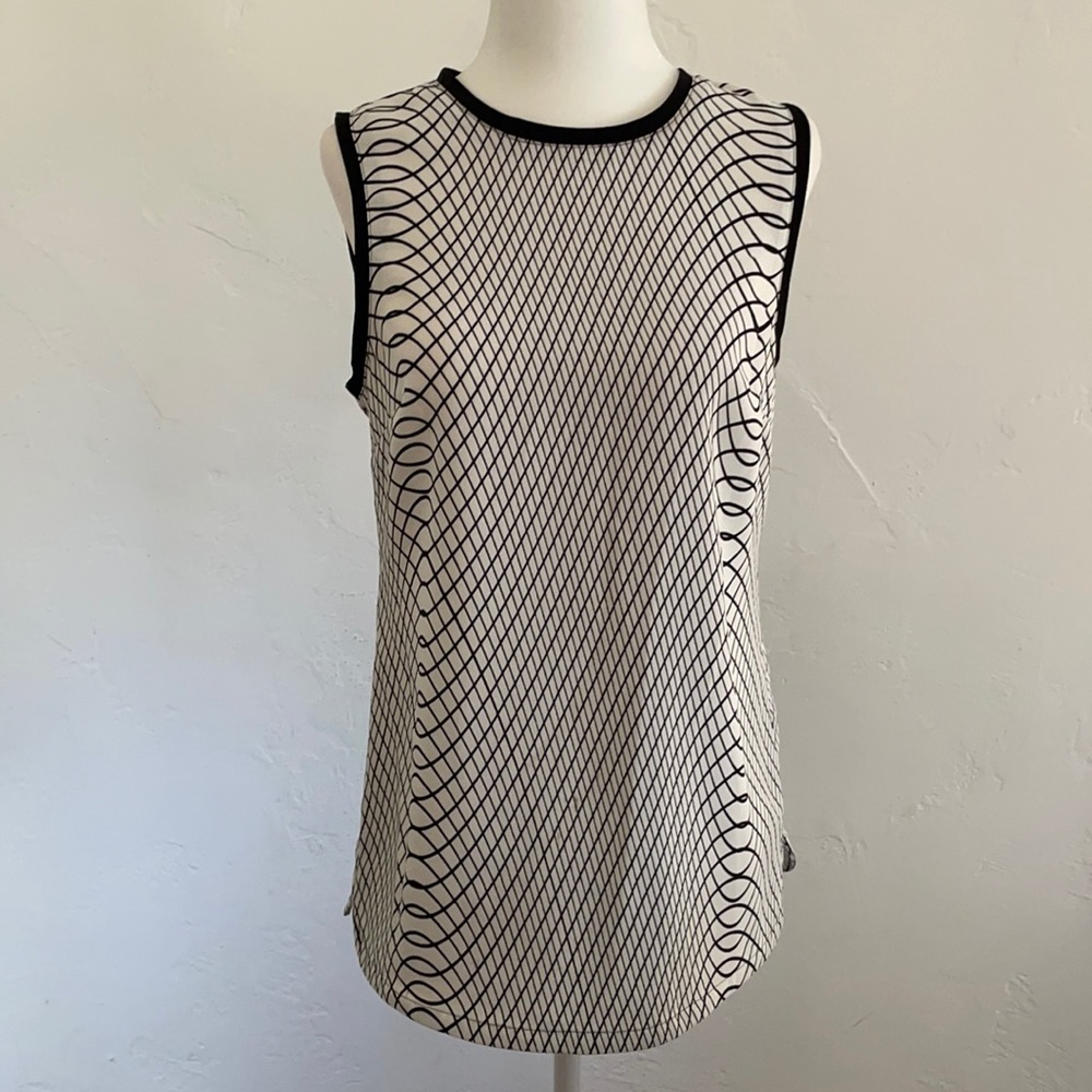 CK women’s top . Black n white color .
